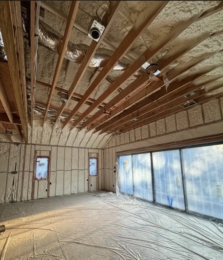 Interior walls and ceiling insulated with spray foam during new construction in Bell