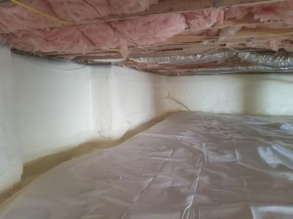 Crawl space encapsulation with closed-cell spray foam for Commercial Roof Restoration in Bell